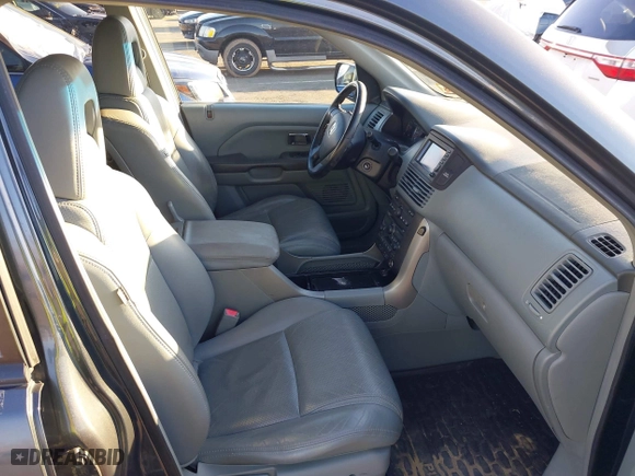 2005 Honda Pilot EX-L with NAVI with VIN 2HKYF18745H564639, listed as a IAAI auction lot 41767115 with 143,725 mi miles. Bid and sale history available at carsss.com. Image 5.