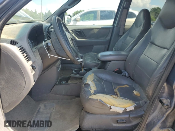 2001 Ford Escape XLT z VIN 1FMYU04111KB13287, wystawiony jako Copart lot #62183415 z przebiegiem 237 142 mil mil oraz Szkoda całkowita • Salvage title. Historia ofert i sprzedaży dostępna na DreamBid. Obrazek 7.