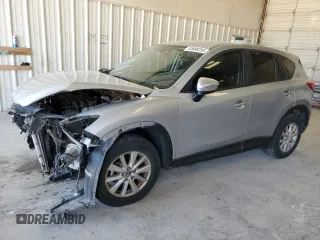 2016 Mazda CX-5 Touring with VIN JM3KE2CY0G0771566, listed as a Copart auction lot 52688255 with 142,204 mi miles and Salvage Title. Bid and sale history available at carsss.com. Image 1.