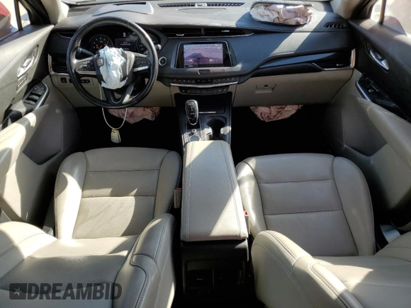 2020 Cadillac XT4 FWD Premium Luxury z VIN 1GYFZCR49LF085682, wystawiony jako Copart lot #47274325 z przebiegiem 52 834 mil mil oraz Szkody całkowita. Historia ofert i sprzedaży dostępna na DreamBid. Obrazek 8.