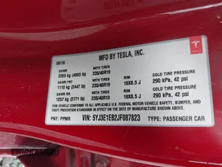 2018 Tesla Model 3 Long Range Battery z VIN 5YJ3E1EB2JF087823, wystawiony jako IAAI lot #41903609 z przebiegiem 69 749 mil mil oraz . Historia ofert i sprzedaży dostępna na DreamBid. Obrazek 9.