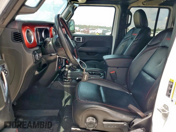 2021 Jeep Wrangler Unlimited Rubicon with VIN 1C4JJXFG1MW849460, listed as a Copart auction lot 62701895 with 54,517 mi miles and Salvage title. Bid and sale history available at DreamBid. Image 7.