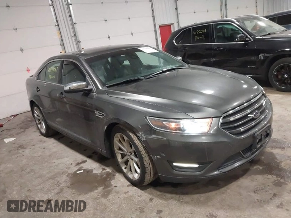 2015 Ford Taurus Limited with VIN 1FAHP2J86FG106828, listed as a IAAI auction lot 41748997 with 221,216 mi miles. Bid and sale history available at carsss.com. Image 1.