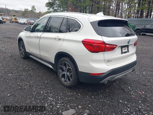 2018 BMW X1 xDrive28i with VIN WBXHT3C36J5L32162, listed as a IAAI auction lot 41802315 with 80,422 mi miles. Bid and sale history available at carsss.com. Image 3.