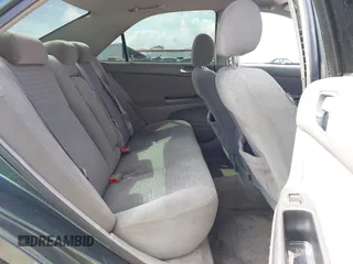 2005 Toyota Camry LE z VIN 4T1BE30K25U398675, wystawiony jako IAAI lot #41923096 z przebiegiem 174 453 mil mil oraz . Historia ofert i sprzedaży dostępna na DreamBid. Obrazek 8.