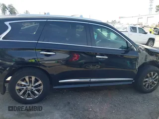 2015 Infiniti QX60 with VIN 5N1AL0MM2FC532247, listed as a IAAI auction lot 41693989 with 122,272 mi miles and . Bid and sale history available at DreamBid. Image 13.