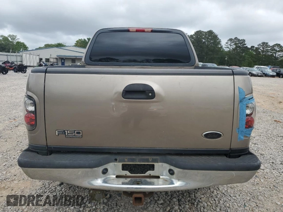 2003 Ford F-150 XLT with VIN 1FTRW08L83KB61404, listed as a Copart auction lot 51869675 with 22,216 mi miles and Salvage Title. Bid and sale history available at carsss.com. Image 6.