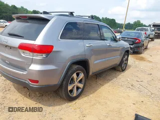 2014 Jeep Grand Cherokee Limited with VIN 1C4RJFBG9EC210507, listed as a IAAI auction lot 42428788 with 141,147 mi miles and . Bid and sale history available at DreamBid. Image 4.