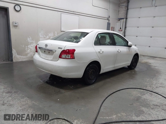 2007 Toyota Yaris with VIN JTDBT923X71058522, listed as a IAAI auction lot 42152157 with 161,050 mi miles. Bid and sale history available at carsss.com. Image 4.