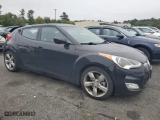 2014 Hyundai Veloster with VIN KMHTC6AD4EU216647, listed as a Copart auction lot 43772655 with 157,288 mi miles and Non Repairable. Bid and sale history available at carsss.com. Image 4.