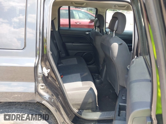 2012 Jeep Patriot Sport with VIN 1C4NJRBB7CD513197, listed as a IAAI auction lot 42408934 with 145,943 mi miles and . Bid and sale history available at DreamBid. Image 8.