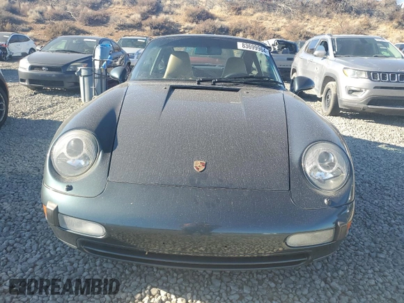 1996 Porsche 911 with VIN WP0DA2996TS385231, listed as a Copart auction lot 83699964 with 60,492 mi miles and Salvage title. Bid and sale history available at DreamBid. Image 5.