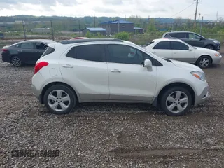 2015 Buick Encore Convenience with VIN KL4CJFSB9FB192053, listed as a IAAI auction lot 42181792 with 135,247 mi miles. Bid and sale history available at carsss.com. Image 13.