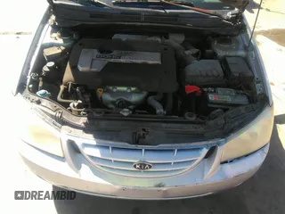 2005 Kia Spectra LX with VIN KNAFE121055121500, listed as a IAAI auction lot 39677018 with 142,307 mi miles. Bid and sale history available at carsss.com. Image 10.