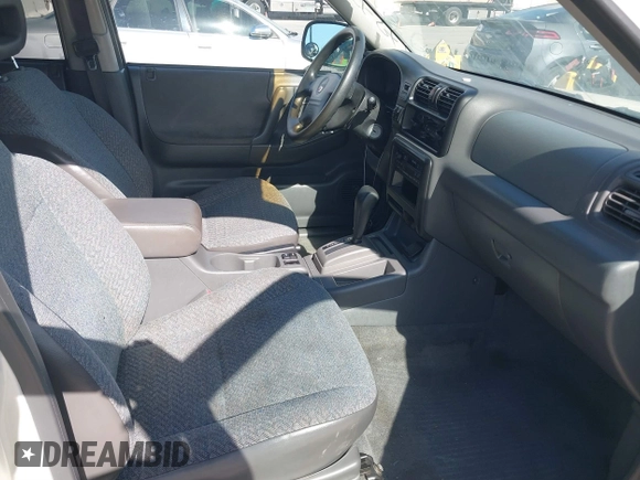 1998 Isuzu Rodeo S z VIN 4S2CK58W4W4308419, wystawiony jako IAAI lot #41711274 z przebiegiem 128 853 mil mil oraz . Historia ofert i sprzedaży dostępna na DreamBid. Obrazek 5.