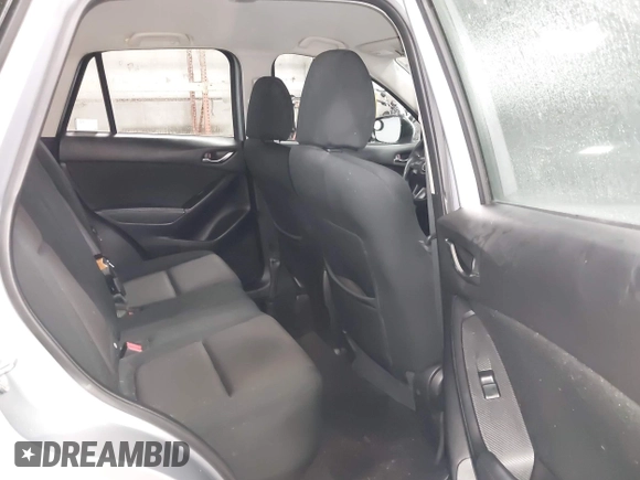 2016 Mazda CX-5 Sport with VIN JM3KE2BY2G0718434, listed as a IAAI auction lot 41961364 with 145,748 mi miles. Bid and sale history available at carsss.com. Image 8.
