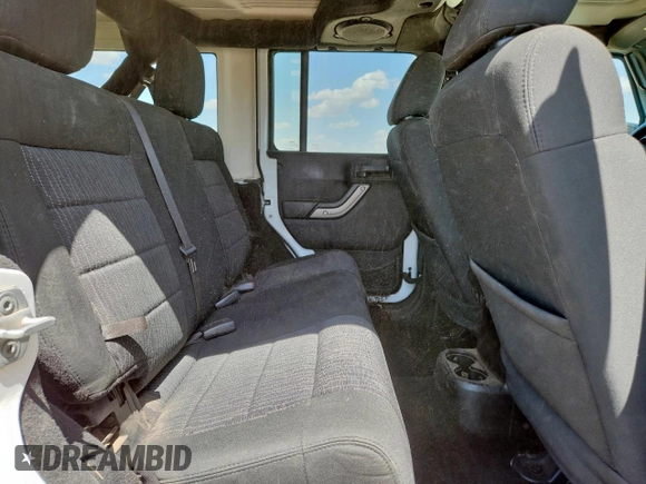 2012 Jeep Wrangler Unlimited Sport with VIN 1C4BJWDG9CL187421, listed as a Copart auction lot 61411145 with 140,390 mi miles and Clean title. Bid and sale history available at DreamBid. Image 11.