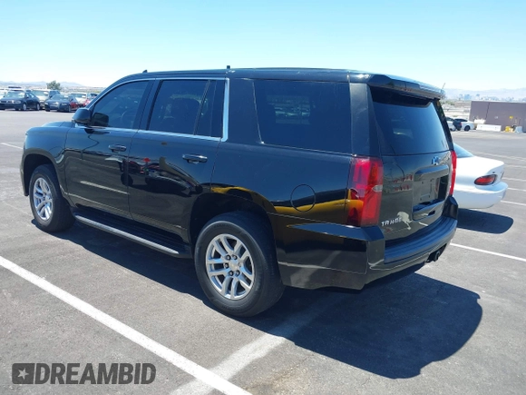 2015 Chevrolet Tahoe Commercial z VIN 1GNLC2EC0FR629983, wystawiony jako IAAI lot #42825604 z przebiegiem 112 410 mil mil oraz . Historia ofert i sprzedaży dostępna na DreamBid. Obrazek 3.