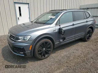 2021 Volkswagen Tiguan SE with VIN 3VV2B7AX2MM099710, listed as a Copart auction lot 58136755 with 24,200 mi miles and Salvage title. Bid and sale history available at DreamBid. Image 1.