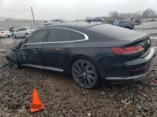 2020 Volkswagen Arteon SEL R-Line z VIN WVWSR7AN1LE014417, wystawiony jako Copart lot #82115513 z przebiegiem 22 494 mil mil oraz . Historia ofert i sprzedaży dostępna na DreamBid. Obrazek 2.