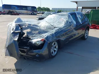 2014 BMW X1 sDrive28i with VIN WBAVM1C53EVW48026, listed as a IAAI auction lot 41714732 with 1 mi miles. Bid and sale history available at carsss.com. Image 2.