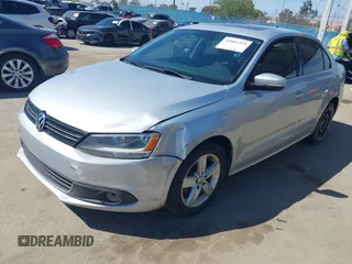 2012 Volkswagen Jetta TDI w/Premium with VIN 3VWLL7AJ8CM314305, listed as a IAAI auction lot 41885355 with 75,669 mi miles and . Bid and sale history available at DreamBid. Image 2.