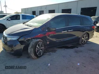 2022 Honda Odyssey Touring with VIN 5FNRL6H82NB039189, listed as a Copart auction lot 48883375 with 63,770 mi miles and Salvage Title. Bid and sale history available at DreamBid. Image 1.