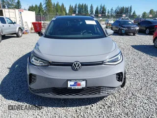 2021 Volkswagen ID.4 Pro S z VIN WVGTMPE20MP058882, wystawiony jako IAAI lot #42317440 z przebiegiem 64 473 mil mil oraz . Historia ofert i sprzedaży dostępna na DreamBid. Obrazek 12.