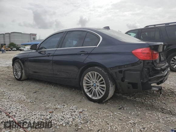 2012 BMW 3 Series 328i with VIN WBA3A5G51CNP17682, listed as a Copart auction lot 59619485 with 100,936 mi miles and Salvage title. Bid and sale history available at DreamBid. Image 2.