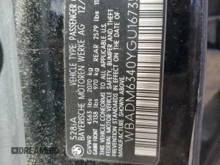 2000 BMW 5 Series 528iA with VIN WBADM6340YGU16735, listed as a Copart auction lot 77249644 with 0 mi miles and Salvage Title. Bid and sale history available at carsss.com. Image 13.