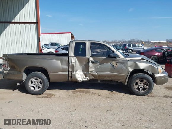 2006 Dodge Dakota SLT with VIN 1D7HE42K16S666071, listed as a IAAI auction lot 41676231 with 129,977 mi miles and . Bid and sale history available at carsss.com. Image 13.