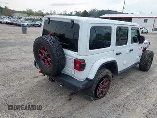 2021 Jeep Wrangler Unlimited Rubicon z VIN 1C4HJXFG1MW577829, wystawiony jako IAAI lot #41997002 z przebiegiem 26 443 mil mil oraz . Historia ofert i sprzedaży dostępna na DreamBid. Obrazek 4.