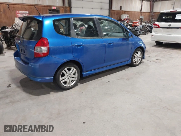 2007 Honda Fit Sport z VIN JHMGD38687S053880, wystawiony jako IAAI lot #42436181 z przebiegiem 124 076 mil mil oraz . Historia ofert i sprzedaży dostępna na DreamBid. Obrazek 4.