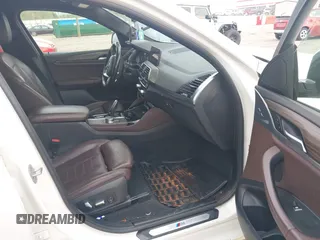2019 BMW X4 xDrive30i with VIN 5UXUJ3C52KLG54945, listed as a IAAI auction lot 42083434 with 153,956 mi miles and . Bid and sale history available at DreamBid. Image 5.