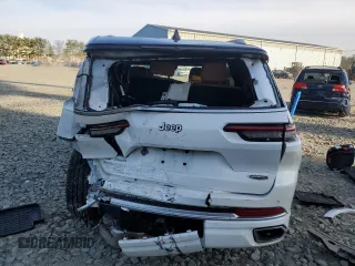 2023 Jeep Grand Cherokee Summit Reserve with VIN 1C4RJKEG8P8723399, listed as a Copart auction lot 51033365 with 32,689 mi miles and Salvage title. Bid and sale history available at DreamBid. Image 6.