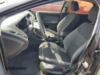 2012 Ford Focus SE with VIN 1FAHP3F22CL372232, listed as a Copart auction lot 59637645 with 134,337 mi miles and Salvage title. Bid and sale history available at DreamBid. Image 7.