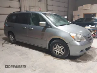 2007 Honda Odyssey EX-L with VIN 5FNRL38697B012944, listed as a IAAI auction lot 42144250 with 234,016 mi miles and . Bid and sale history available at DreamBid. Image 1.