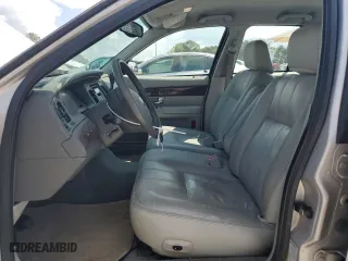 2005 Mercury Grand Marquis LS Premium with VIN 2MEHM75W75X657043, listed as a Copart auction lot 71648694 with 143,672 mi miles and Salvage Title. Bid and sale history available at carsss.com. Image 7.