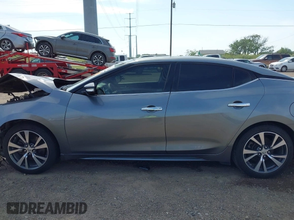 2016 Nissan Maxima SL z VIN 1N4AA6AP3GC392390, wystawiony jako IAAI lot #42260676 z przebiegiem 135 259 mil mil oraz . Historia ofert i sprzedaży dostępna na DreamBid. Obrazek 15.