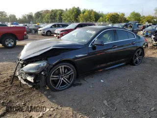 2013 BMW 6 Series 650i xDrive with VIN WBA6B4C57DDG67584, listed as a Copart auction lot 70319464 with 0 mi miles and Salvage Title. Bid and sale history available at carsss.com. Image 1.