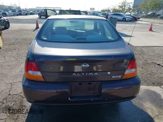 1999 Nissan Altima XE with VIN 1N4DL01D3XC209869, listed as a IAAI auction lot 41414580 with 175,076 mi miles. Bid and sale history available at carsss.com. Image 16.