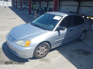 2001 Honda Civic LX with VIN 2HGES15541H585531, listed as a IAAI auction lot 42084501 with 229,328 mi miles. Bid and sale history available at carsss.com. Image 2.