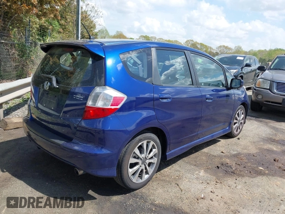 2013 Honda Fit Sport with VIN JHMGE8H57DC067048, listed as a IAAI auction lot 41939330 with 111,368 mi miles. Bid and sale history available at carsss.com. Image 4.