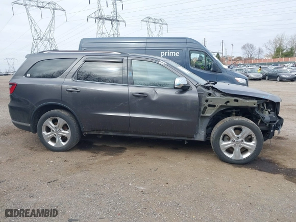 2014 Dodge Durango Limited with VIN 1C4SDJDTXEC345520, listed as a IAAI auction lot 41406601 with 148,216 mi miles. Bid and sale history available at carsss.com. Image 14.