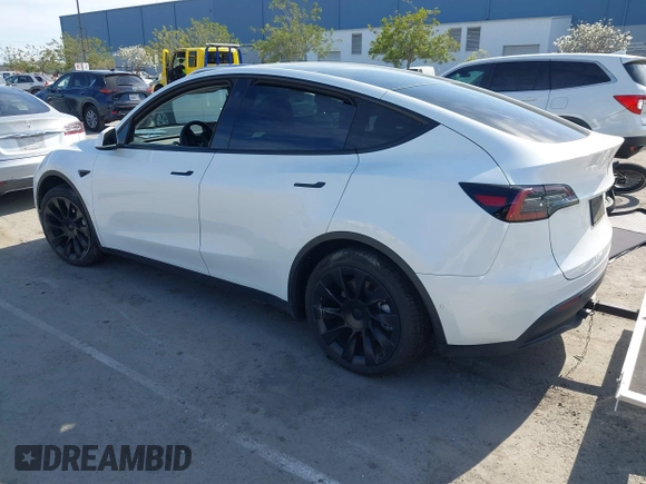 2022 Tesla Model Y Long Range with VIN 7SAYGDEE0NF340822, listed as a IAAI auction lot 41881224 with Not Provided miles and . Bid and sale history available at DreamBid. Image 3.