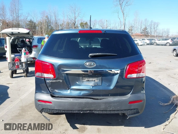2011 Kia Sorento LX with VIN 5XYKT3A1XBG158819, listed as a IAAI auction lot 41665390 with 120,570 mi miles. Bid and sale history available at carsss.com. Image 16.