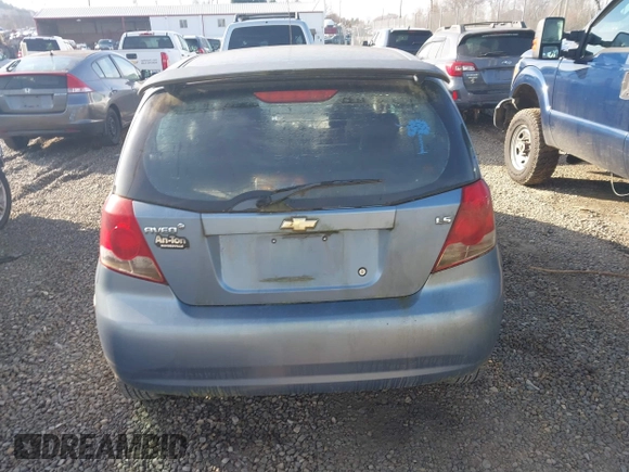 2007 Chevrolet Aveo LS z VIN KL1TD666X7B728902, wystawiony jako IAAI lot #40950124 z przebiegiem Nie podano mil oraz . Historia ofert i sprzedaży dostępna na DreamBid. Obrazek 16.