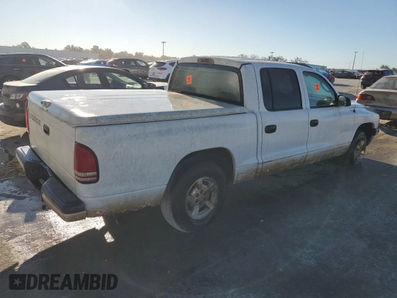 2001 Dodge Dakota z VIN 1B7HL2AX41S256519, wystawiony jako Copart lot #81951634 z przebiegiem Nie podano mil oraz Nie do naprawy • Non repairable. Historia ofert i sprzedaży dostępna na DreamBid. Obrazek 3.