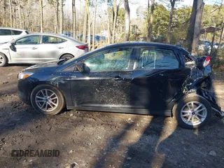 2018 Ford Focus SE with VIN 1FADP3F20JL218002, listed as a IAAI auction lot 41636952 with 90,059 mi miles and . Bid and sale history available at carsss.com. Image 15.