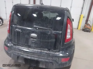 2013 Kia Soul + with VIN KNDJT2A62D7751897, listed as a IAAI auction lot 41822370 with 164,563 mi miles. Bid and sale history available at carsss.com. Image 12.